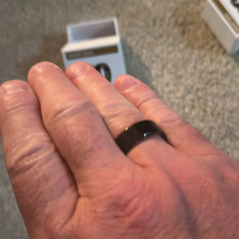 Minimalist Gold and Black Wearable Rings with Smart Features